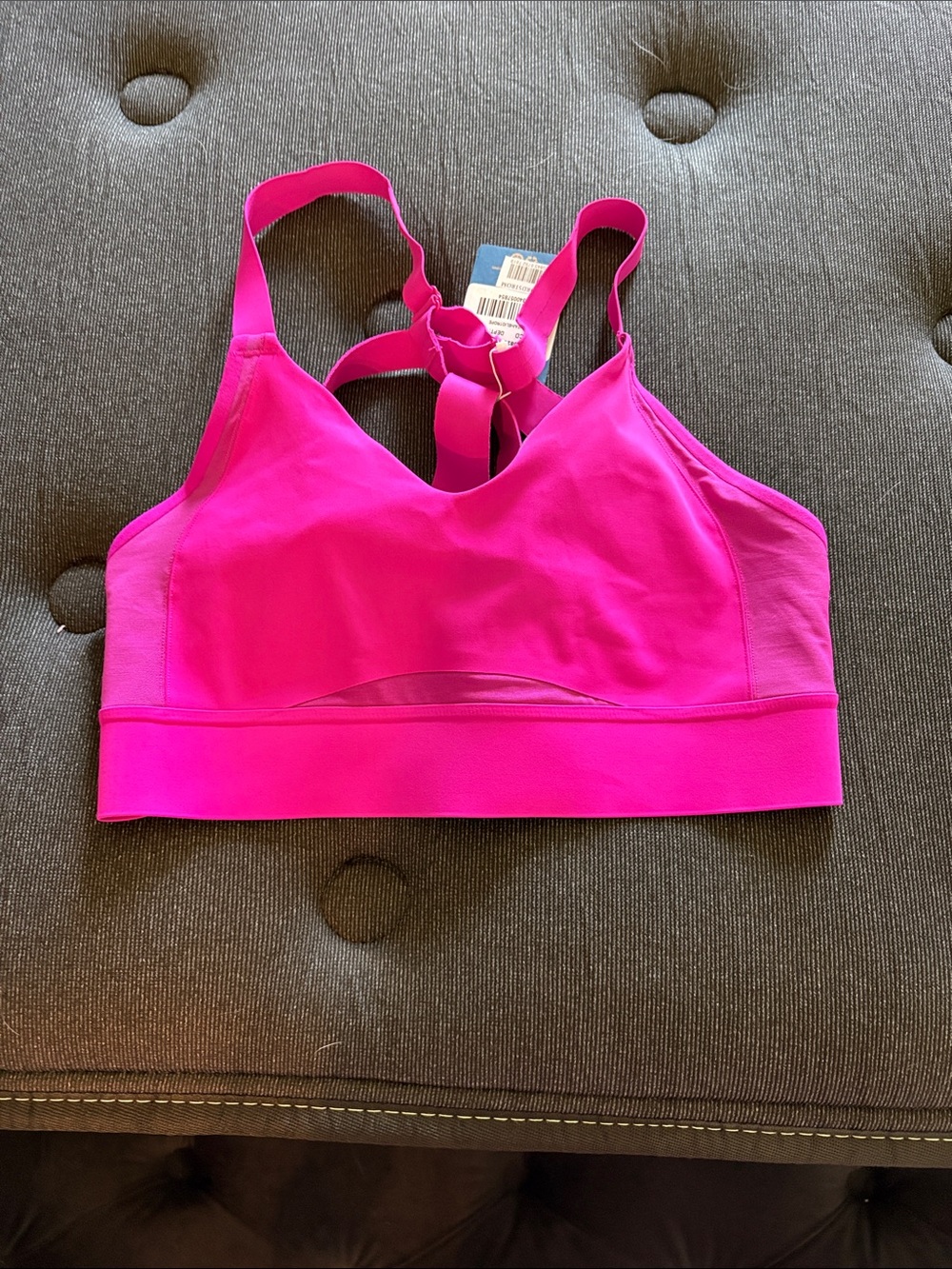hot pink brooks sports bra
